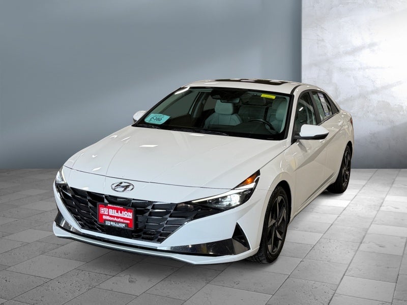 2023 Hyundai Elantra Hybrid Limited in Lunar White — front three-quarter view